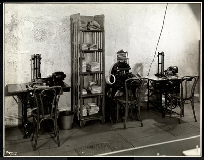 Three addressing machines in the office of the Carolyn Laundry at 111 East 128th Street, East Harlem, New York by Byron Company